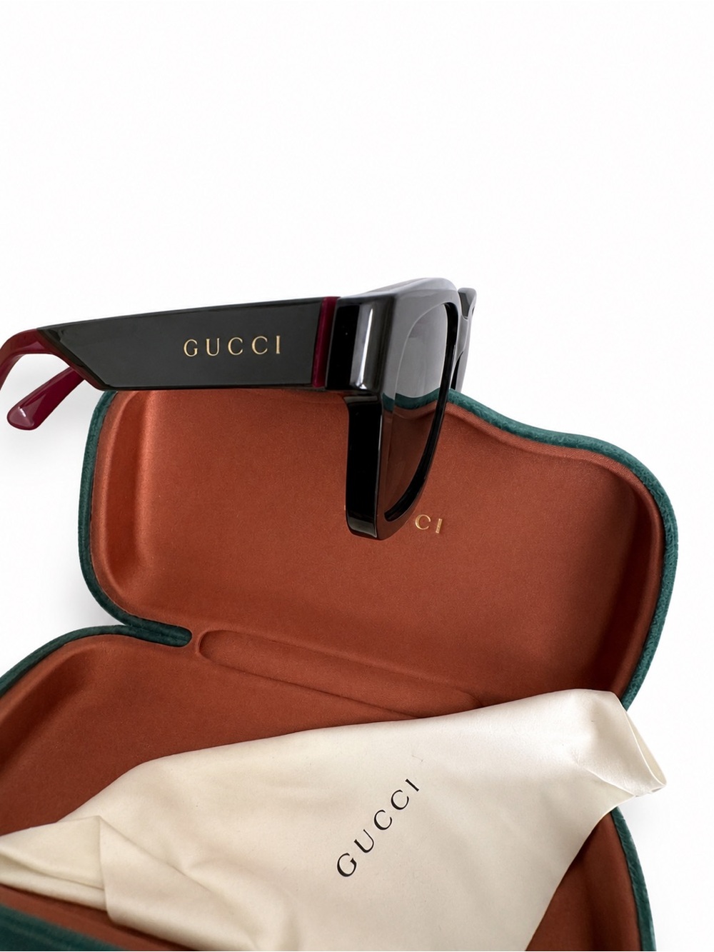 Gucci Black Sunglasses with Red Temple Ends and Gold Logo